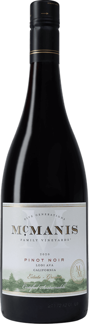 Pinot Noir 2023 Het label is overwegend wit met gouden en zwarte accenten. Centraal staat de naam 'McManis' in grote, goudkleurige letters. Bovenaan het label staat 'Five Generations'. Onderaan is een kleine illustratie van een wijngaard of natuurtafereel te zien in zachte groene tinten. Rechtsonder staat een rond zegel met initialen en extra tekst.